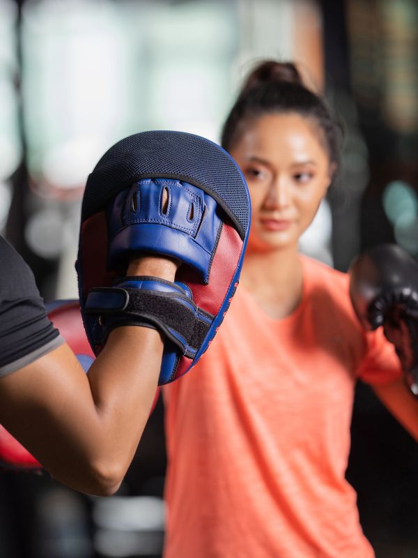 woman-boxing-with-personal-trainer-new-bedford-ma